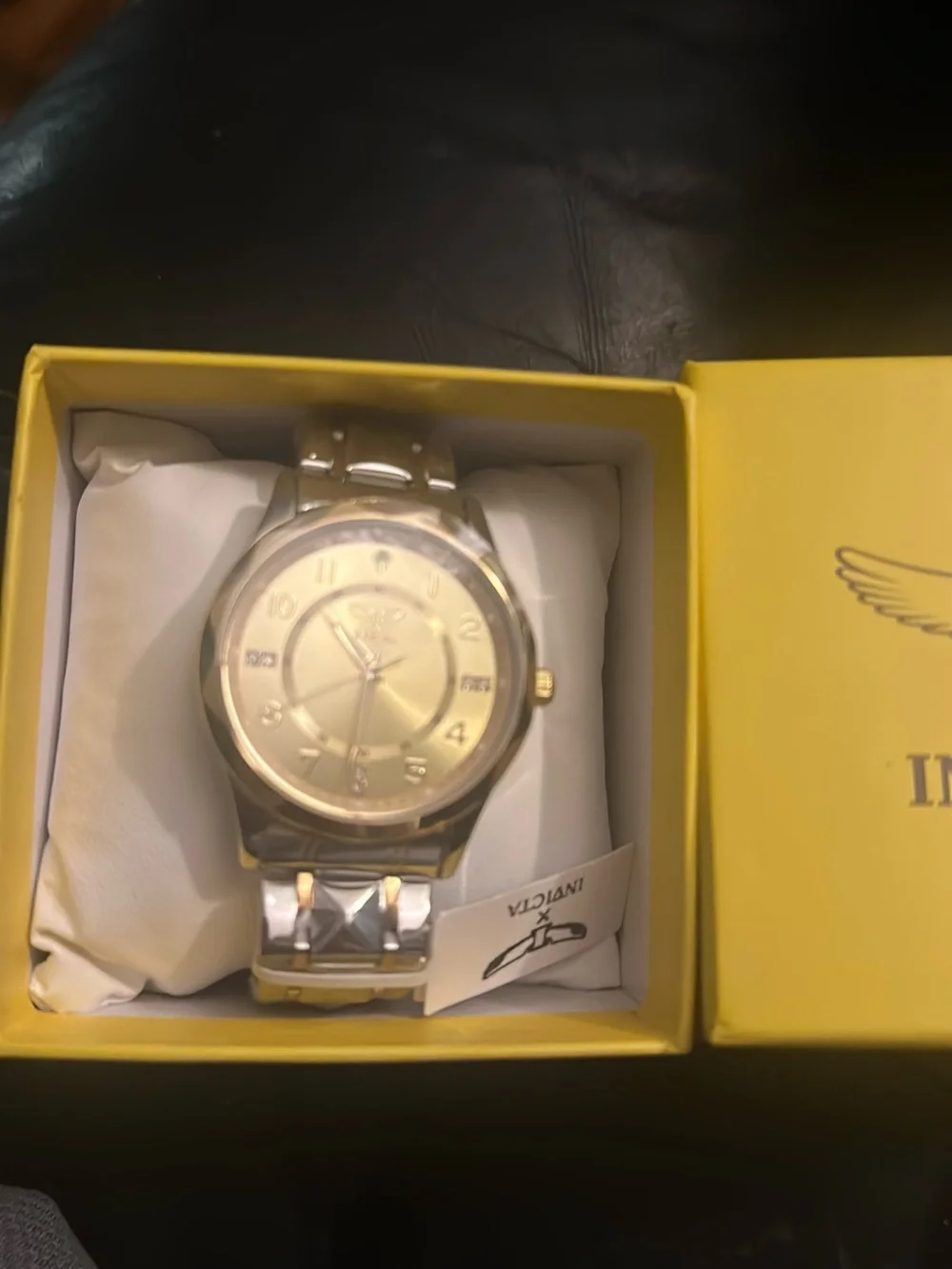 Invicta Men’s Silver and Gold-Tone Bracelet Watch